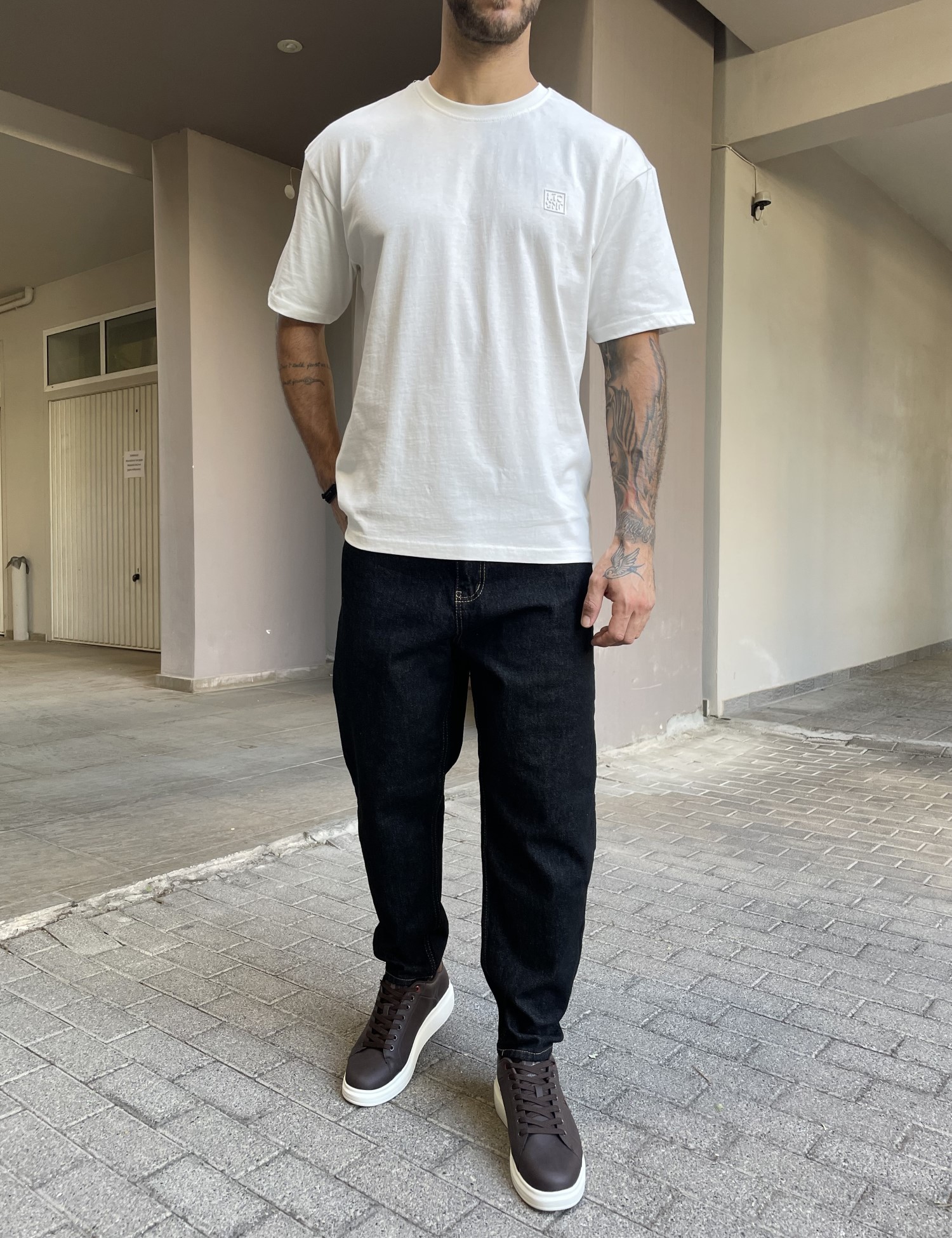 Ανδρικό μαύρο ελαστικό loose τζιν πεντάτσεπο με φερμουάρ G88101 φωτογραφία